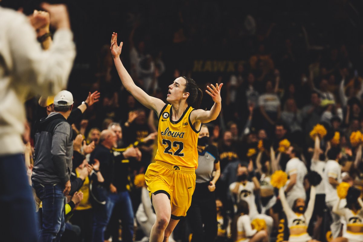 Caitlin Clark gestures to the crowd