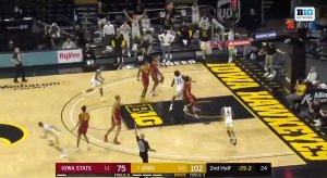 Austin Ash hoists a look-away 3 from deep and splashes it home