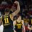 Iowa Hawkeyes guard Tony Perkins reacts after a three point basket