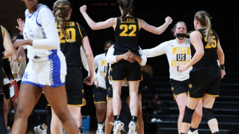 Caitlin Clark led Iowa with 35 points to help the Hawkeyes advance to the Sweet 16