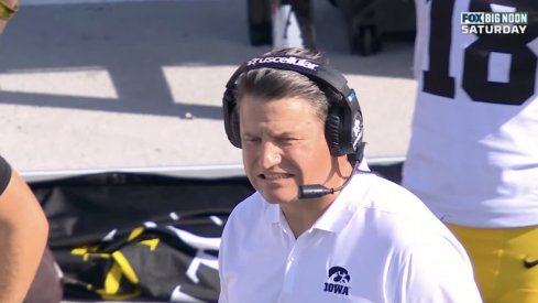 Brian Ferentz grimaces after his quarterback gets sacked by Ohio State's entire defense