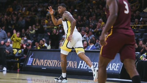 Tony Perkins celebrates a three-pointer