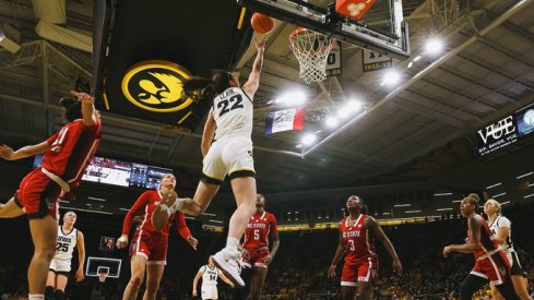 Caitlin Clark scores a layup against NC State