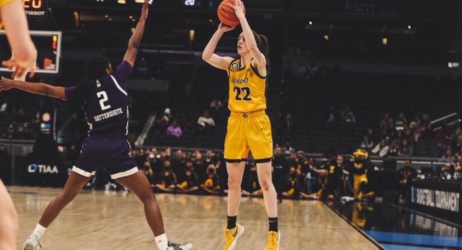 Caitlin Clark scored 19 points, grabbed 12 rebounds, and dished 6 assists in Iowa's win over Northwestern