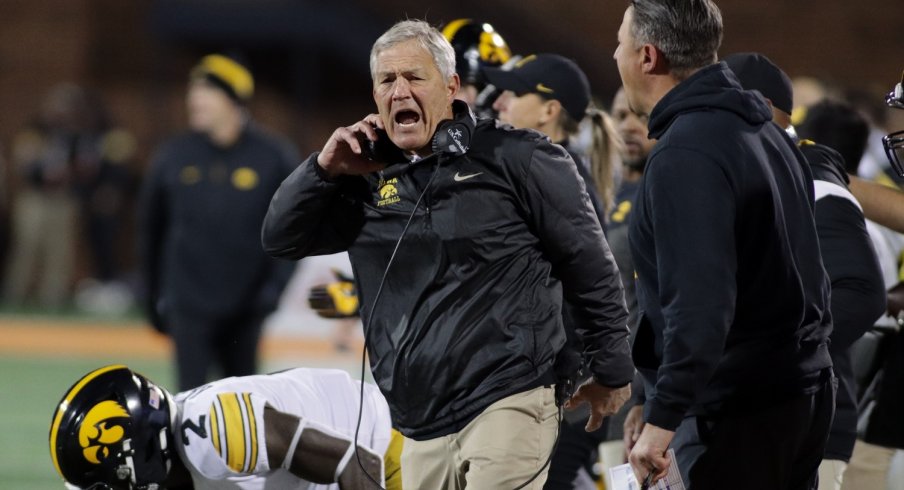 Kirk Ferentz and Brian Ferentz yelling after an Iowa penalty on an unspecified assistant coach.
