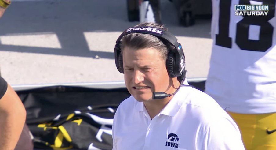 Brian Ferentz grimaces after his quarterback gets sacked by Ohio State's entire defense
