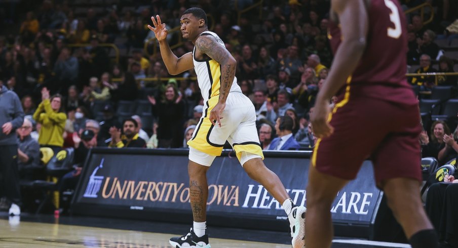 Tony Perkins celebrates a three-pointer