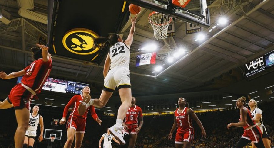 Caitlin Clark scores a layup against NC State