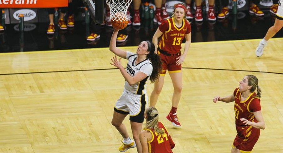 McKenna Warnock makes a layup against Iowa State