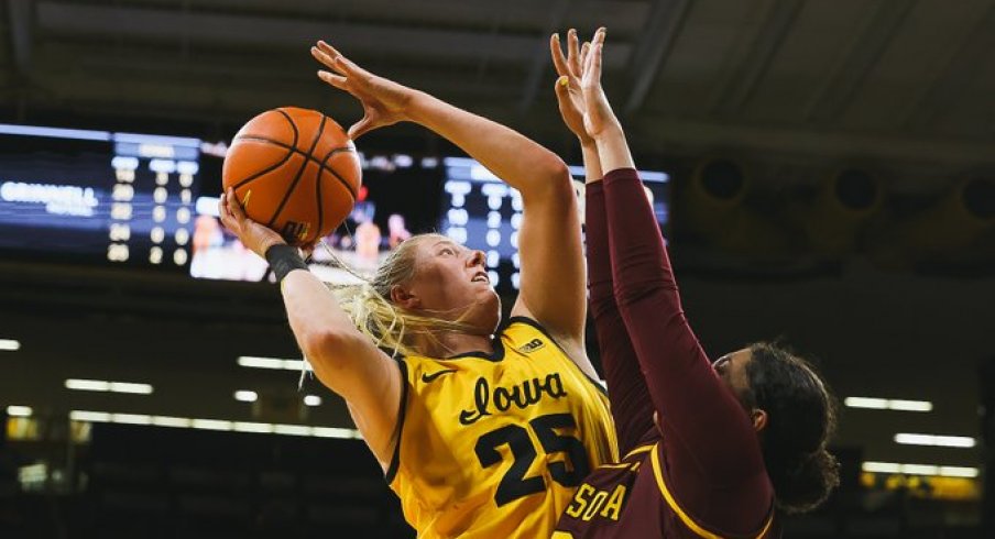Monika Czinano goes up for a shot against Minnesota